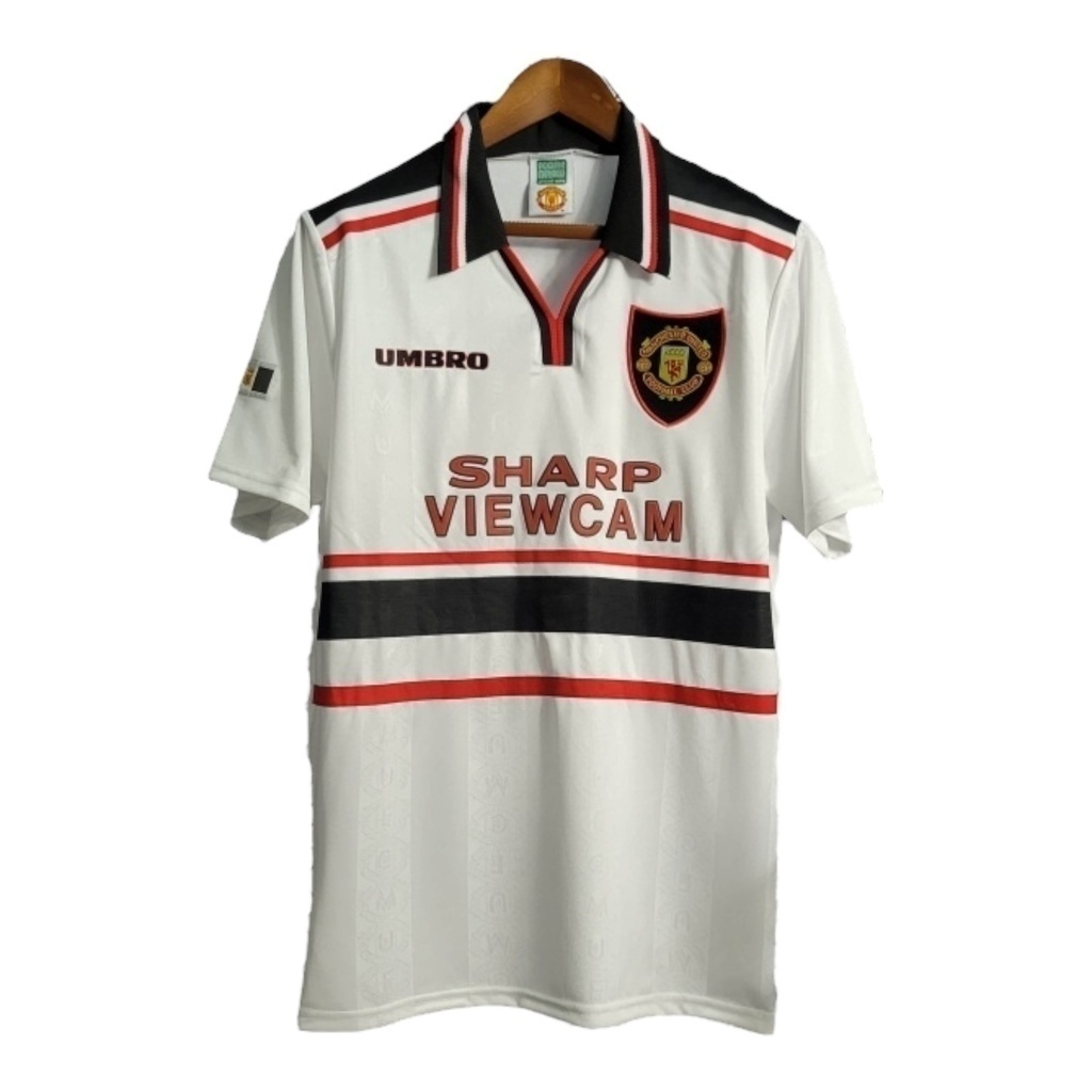 Camisa Manchester United 1998/1999 - Retrô Umbro - Branca com detalhes em preto e vermelho