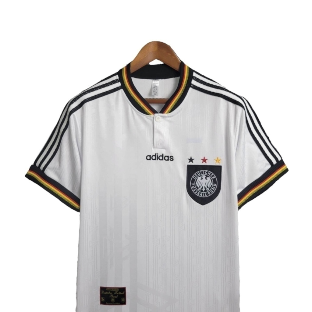 Camisa Manchester United 1996 - Retrô Umbro - Branca com detalhes em preto e vermelho e amarelo