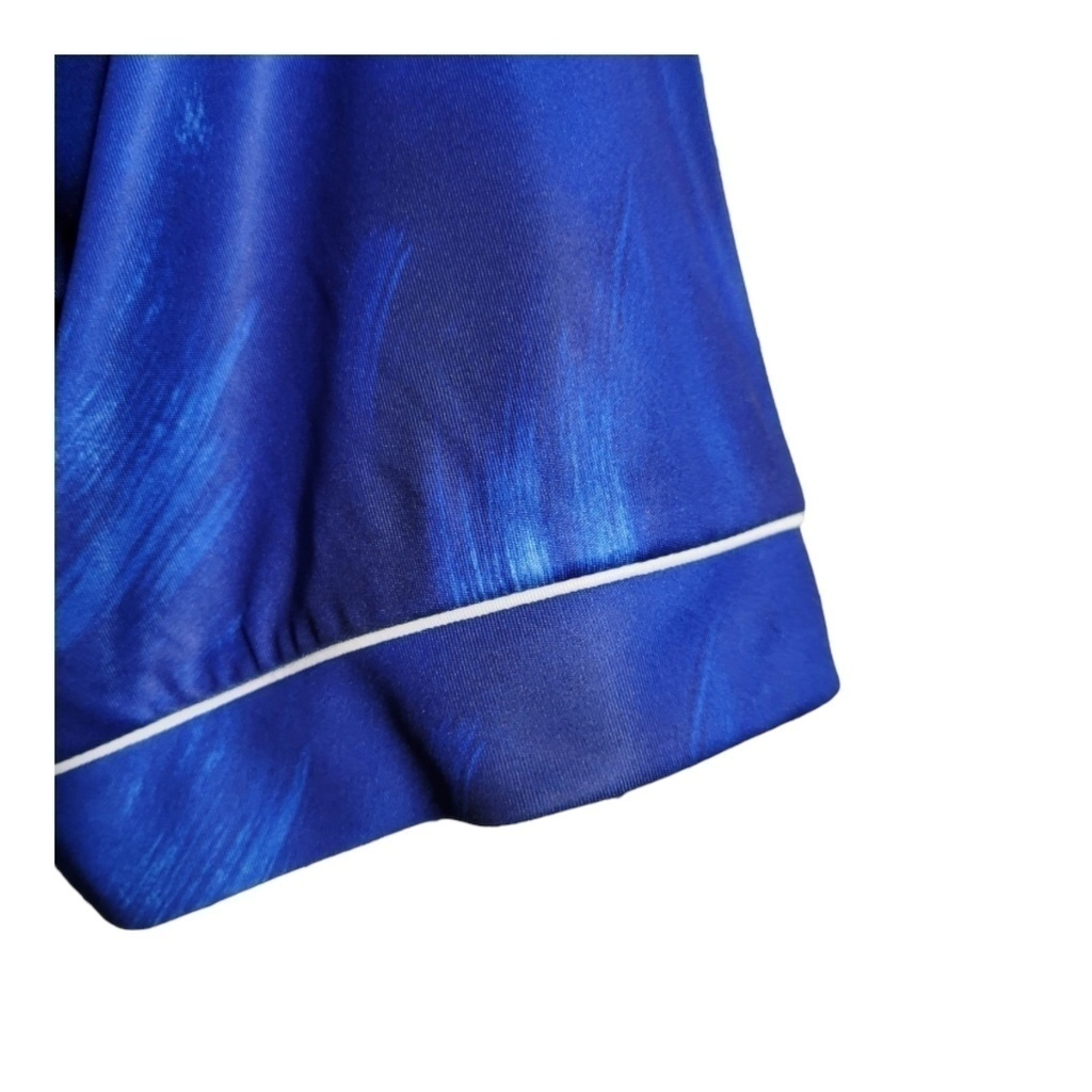Camisa Newcastle 1993/1995 - Retrô Asics - Azul com detalhes em branco e preto
