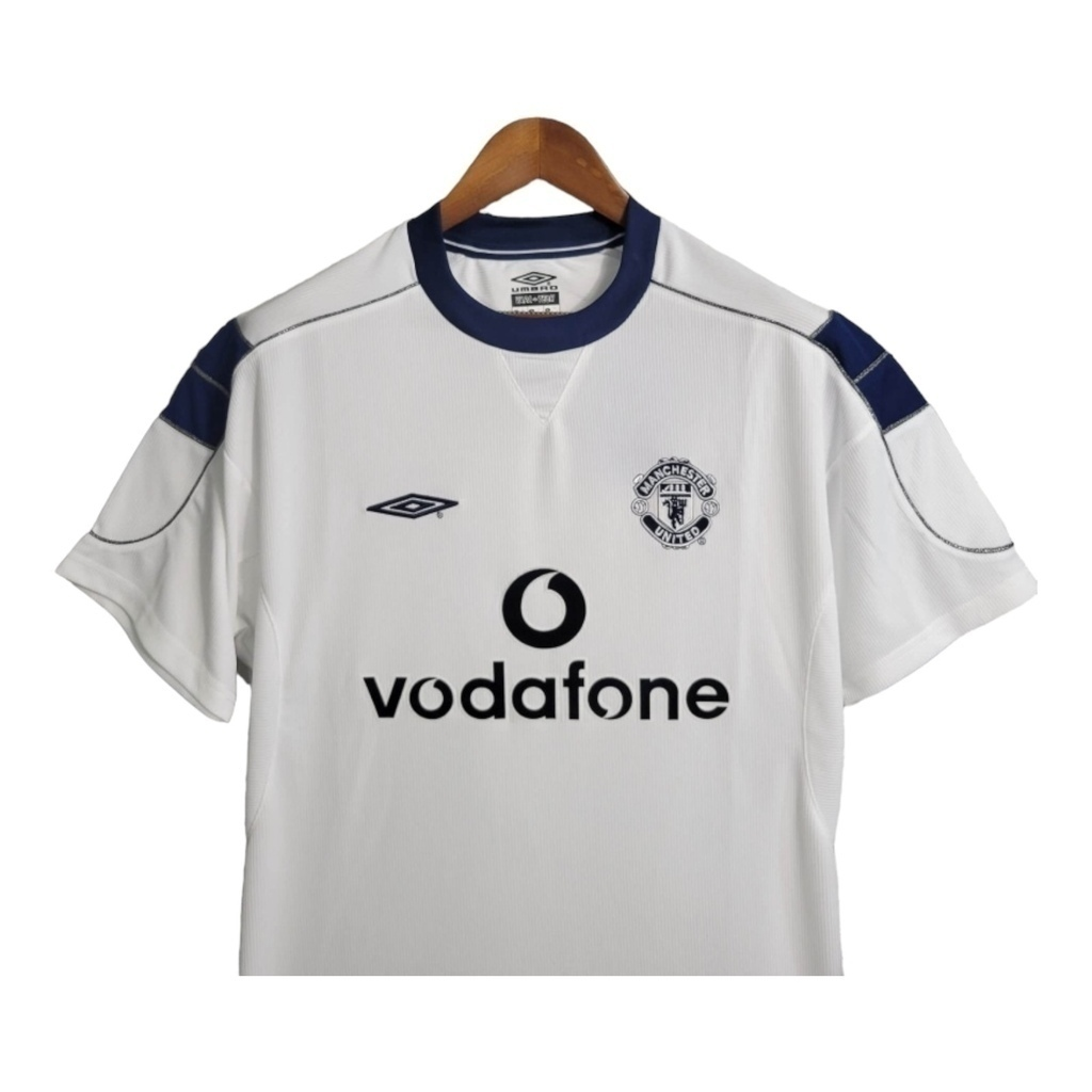 Camisa Manchester United II 1990/2000 - Retrô Umbro - Branca com detalhes em azul