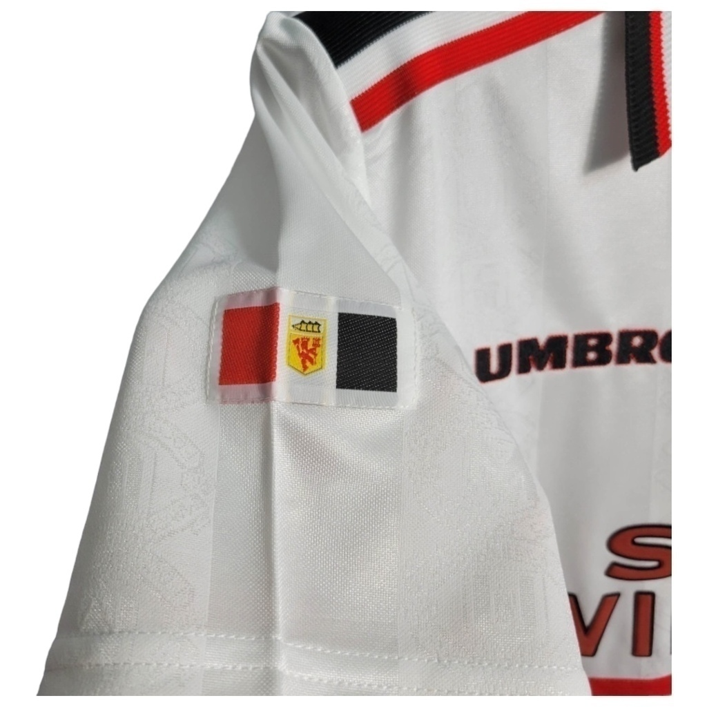 Camisa Manchester United 1998/1999 - Retrô Umbro - Branca com detalhes em preto e vermelho